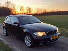 BMW 1serie 1 6L 116 3DR 2009 zwart