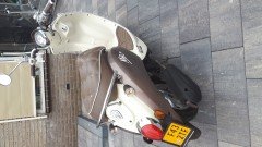 Mooie Sym mio 50 bromscooter  weinig kilometers