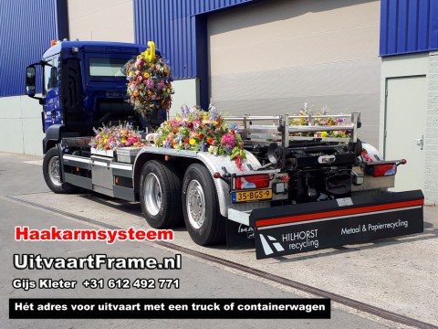 Uitvaart met een afzet containerwagen