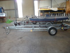 Te koop aangeboden  Kajuitboot met motor en trailer